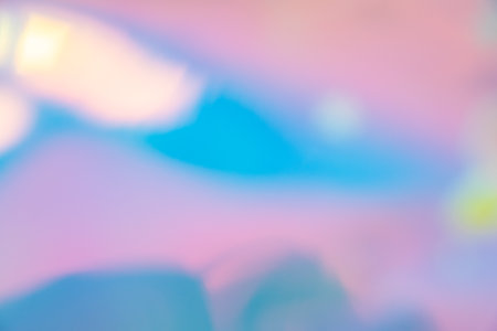 Abstract blur holographic rainbow foil iridescent backgroundの写真素材