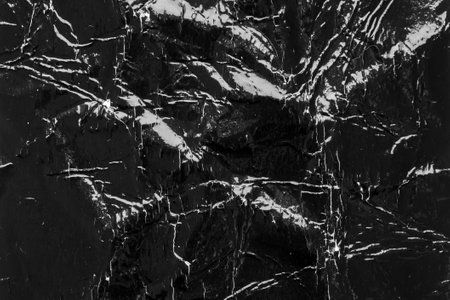 Empty old vintage black scratch torn poster overlay texture backgroundの写真素材