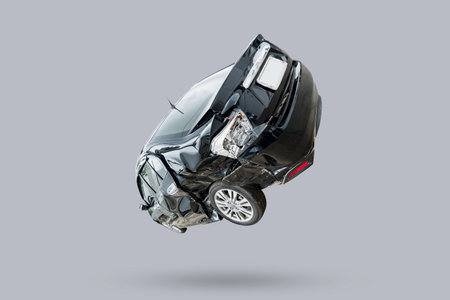 Car crash accident damaged isolated on gray backgroundの写真素材