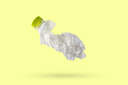 recycled plastic bottle isolated on green background