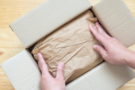 Eco friendly brown paper honeycomb wrap for product packaging parcel carton boxの写真素材