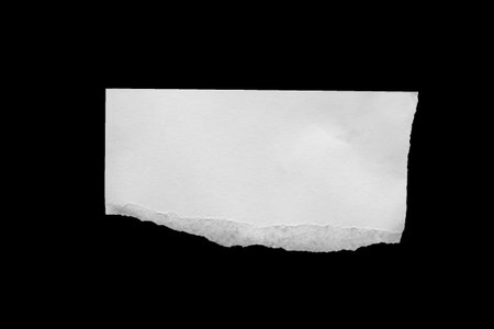 White ripped paper torn edges strips isolated on black backgroundの写真素材