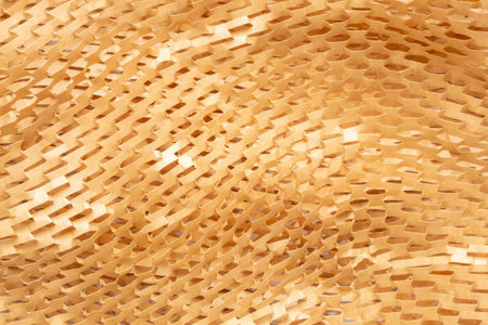 Eco friendly brown paper honeycomb texture wrap background for product packaging parcel carton boxの写真素材