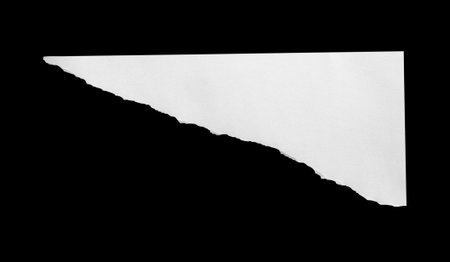 White ripped paper torn edges strips isolated on black backgroundの写真素材