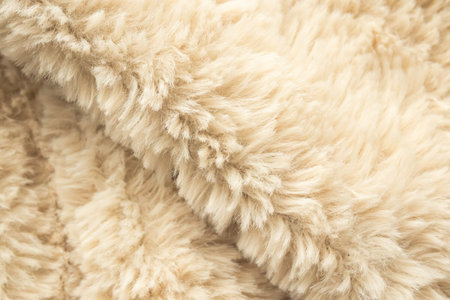 Brown fluffy fur fabric wool texture backgroundの写真素材