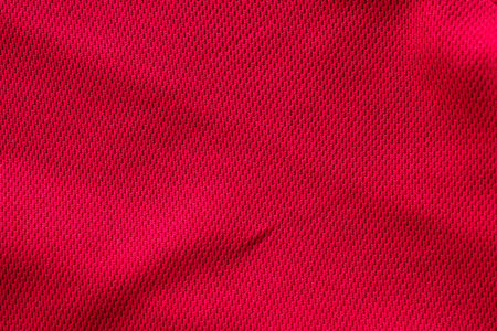 Red sports clothing fabric football shirt jersey texture background