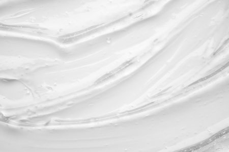 Transparent clear liquid serum gel cosmetic texture backgroundの写真素材