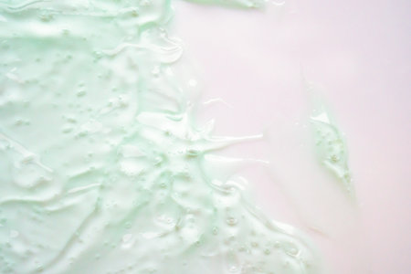 Transparent clear green liquid serum gel cosmetic texture background
