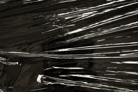 transparent plastic film wrap overlay texture backgroundの写真素材