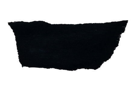piece of black paper tear isolated on white backgroundの写真素材