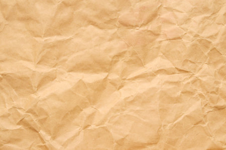 Abstract crumpled and creased recycle brown paper texture backgroundの写真素材