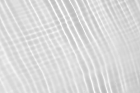 Abstract white transparent water shadow surface texture natural ripple backgroundの写真素材