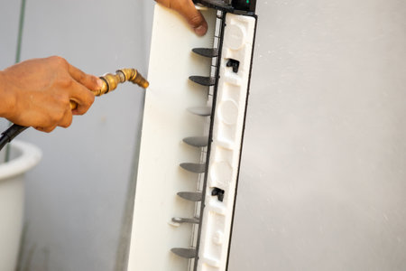 air conditioning cleaning service with water sprayの写真素材
