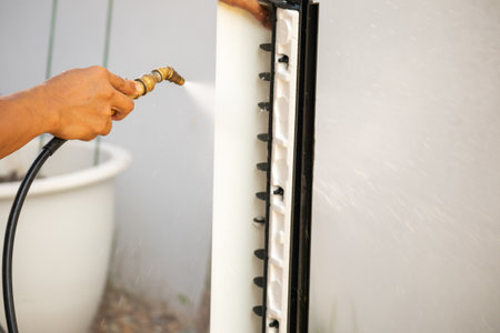 air conditioning cleaning service with water sprayの写真素材