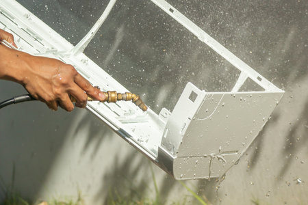 air conditioning cleaning service with water sprayの写真素材