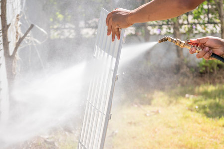 air conditioning filter cleaning with water sprayの写真素材