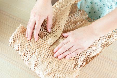 Eco friendly brown paper honeycomb wrap for product packaging parcel carton boxの写真素材
