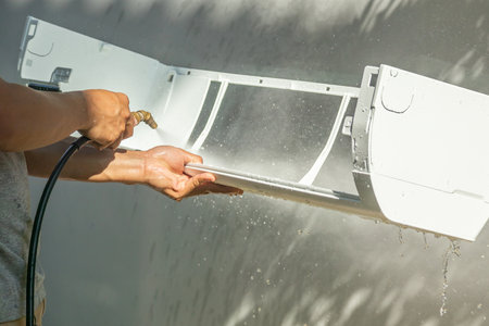 air conditioning cleaning service with water sprayの写真素材
