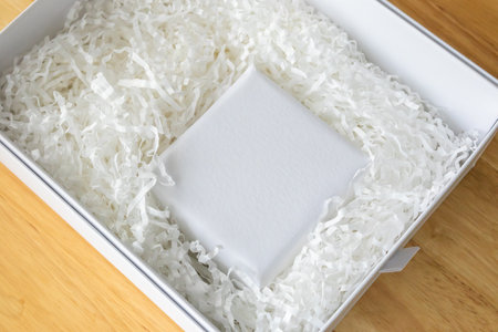 Eco friendly white paper wrap for product packaging parcel carton boxの写真素材