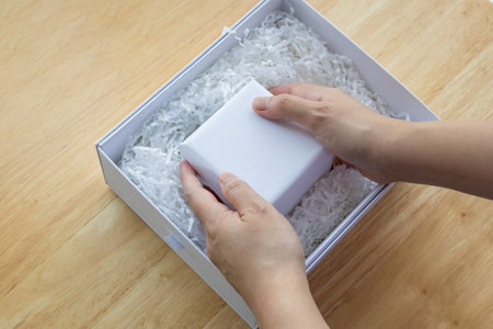 Eco friendly white paper wrap for product packaging parcel carton boxの写真素材