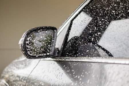 car cleaning and washing with foam soapの写真素材