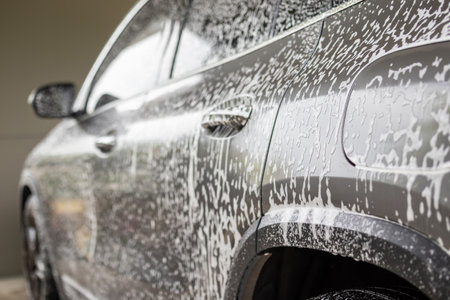 car cleaning and washing with foam soapの写真素材