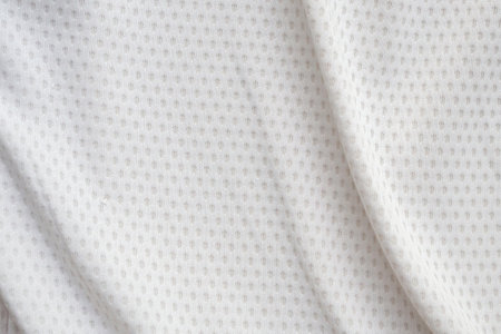 White sports clothing fabric football shirt jersey texture abstract backgroundの写真素材
