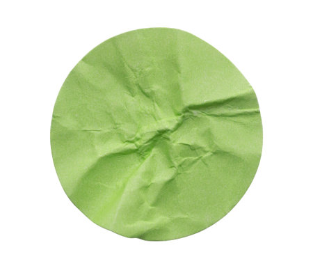 Blank green round adhesive paper sticker label isolated on white backgroundの写真素材