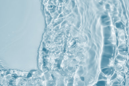 Abstract transparent water shadow surface texture natural ripple on blue backgroundの写真素材