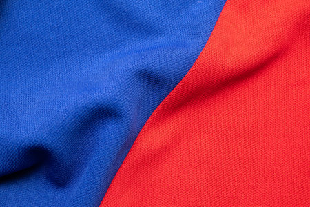 Blue and red sports clothing fabric football shirt jersey textureの写真素材