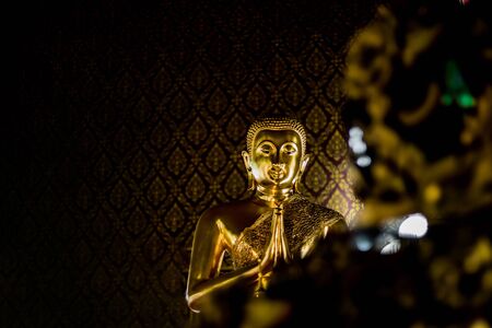 Big gold  Buddha whit pattern backgroundの写真素材