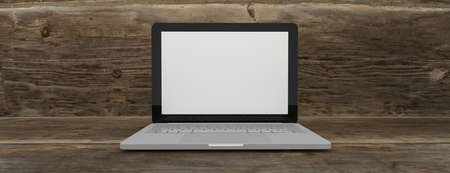 Laptop computer white blank screen on work table front view. Copy space. 3d renderingの写真素材