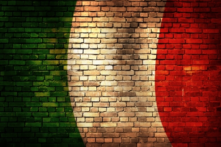 Italy flag painted on old grunge brick wallの写真素材