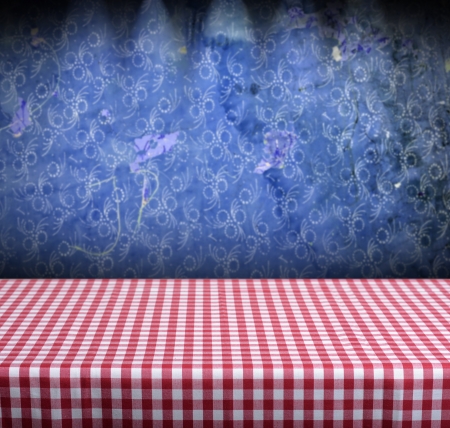 Background with table and vintage blue wallpaperの写真素材