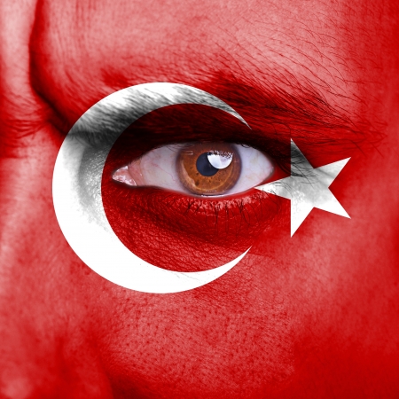 Turkey flag painted on angry man faceの写真素材