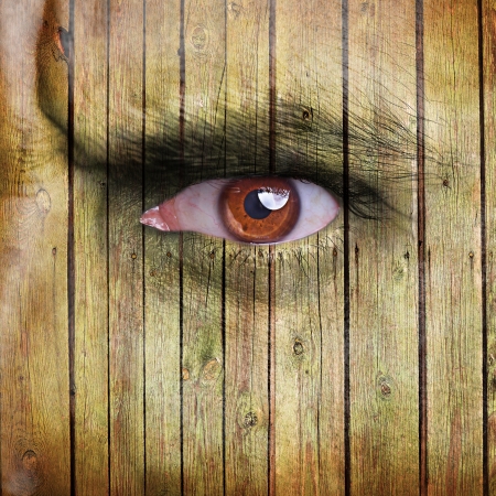 Angry man face covered with wooden textureの写真素材