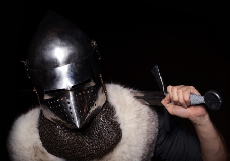 Portrait of XV century knight on black backgroundの写真素材