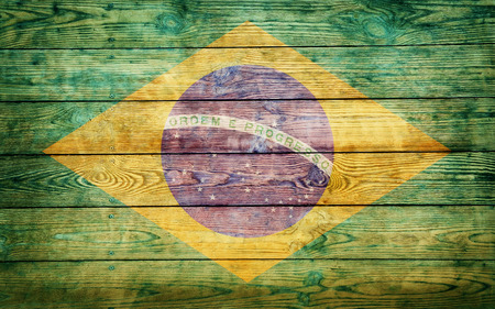 Brazil flag on old wooden backgroundの写真素材