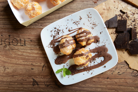 Profiteroles - italian dessert witch chocolate sauce