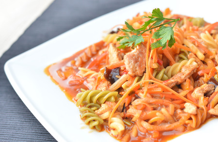 Pasta with meat and sweet and sour sauceの写真素材