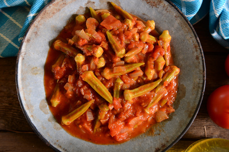 Okra dish with tomatoes (Traditional greek, romanian, bulgarian and turkish dish)の写真素材