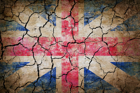 UK flag painted on cracked earth textureの写真素材