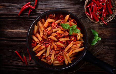 Penne pasta with chili sauce arrabiataの写真素材
