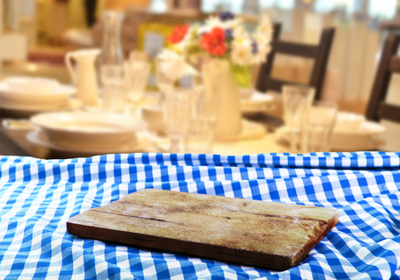 Empty table with empty cutting board for product display montagesの写真素材