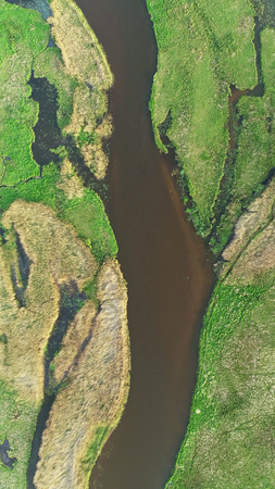 Aerial view of natural river in spring