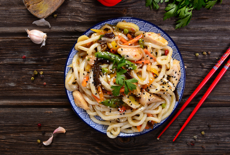 Udon noodles with meat and vegetablesの写真素材