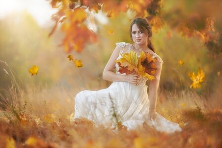 Beautiful caucasian brunette autumn portrait の写真素材