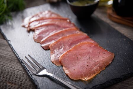 Tasty cold smoked tuna slicesの写真素材
