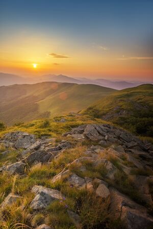 Beautiful summer sunset in the mountainsの写真素材