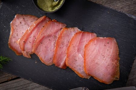 Tasty cold smoked tuna slicesの写真素材